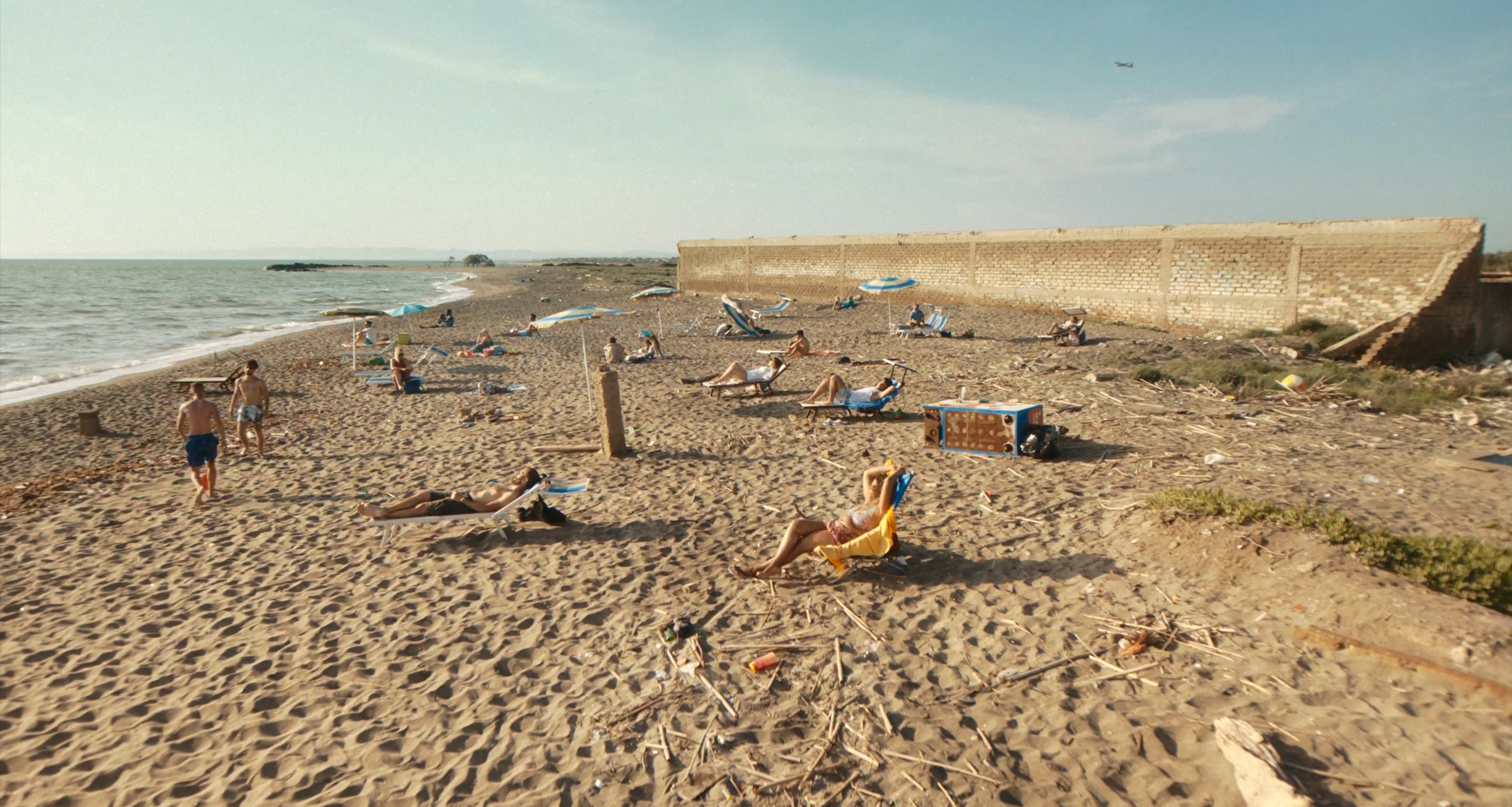 A wide view of people relaxing on a beach