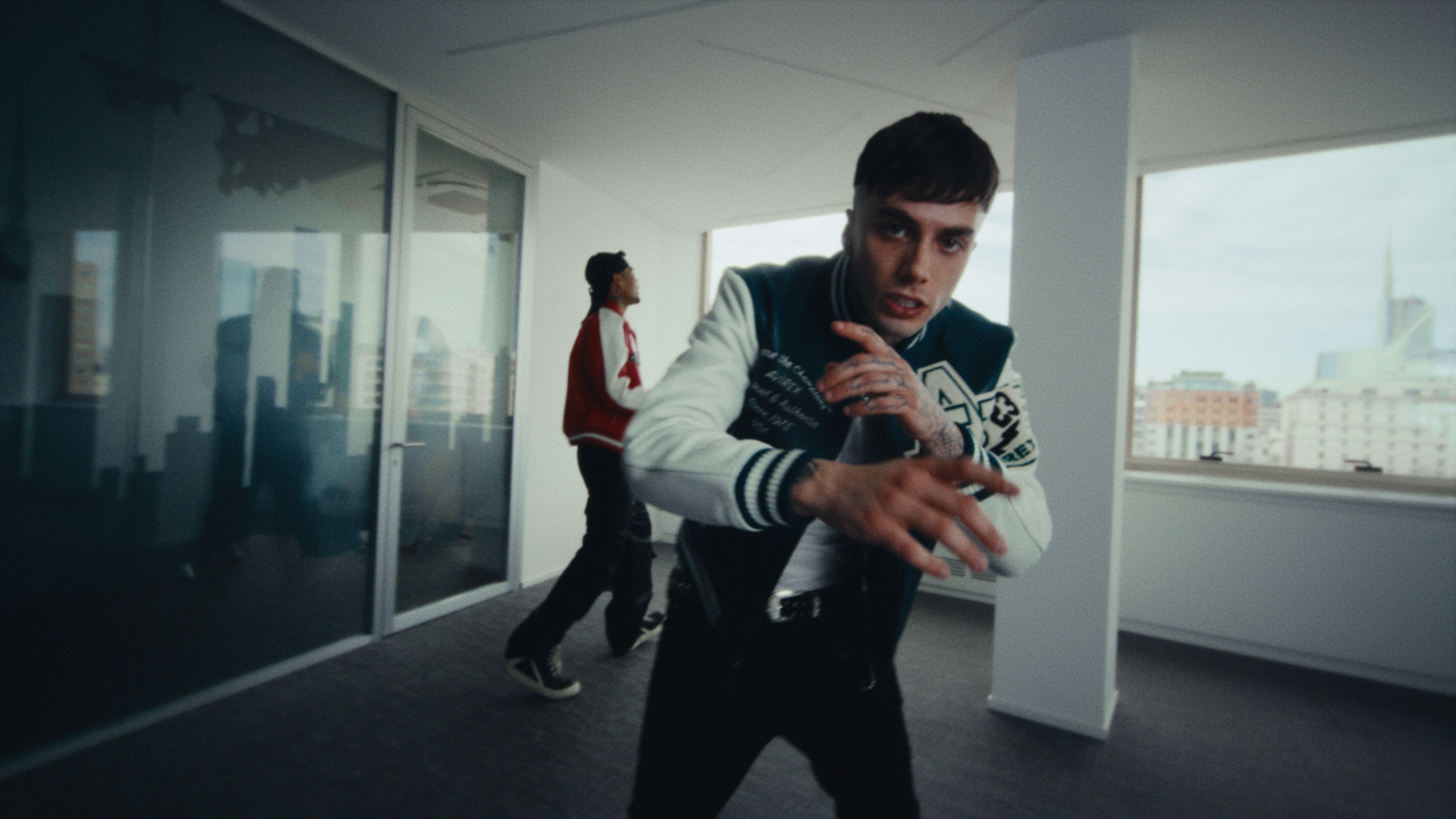 An artist performing in a bright office